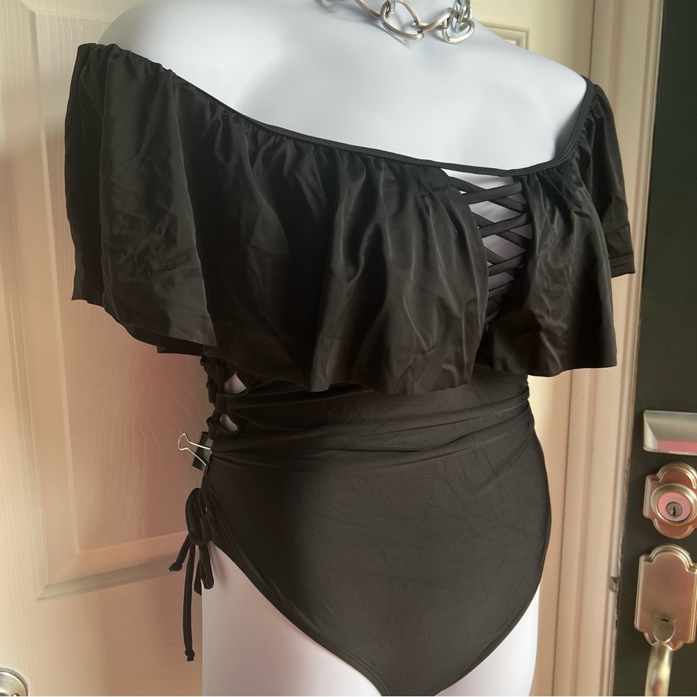 Rue Black Ruffle open on sides one piece bathing suit
